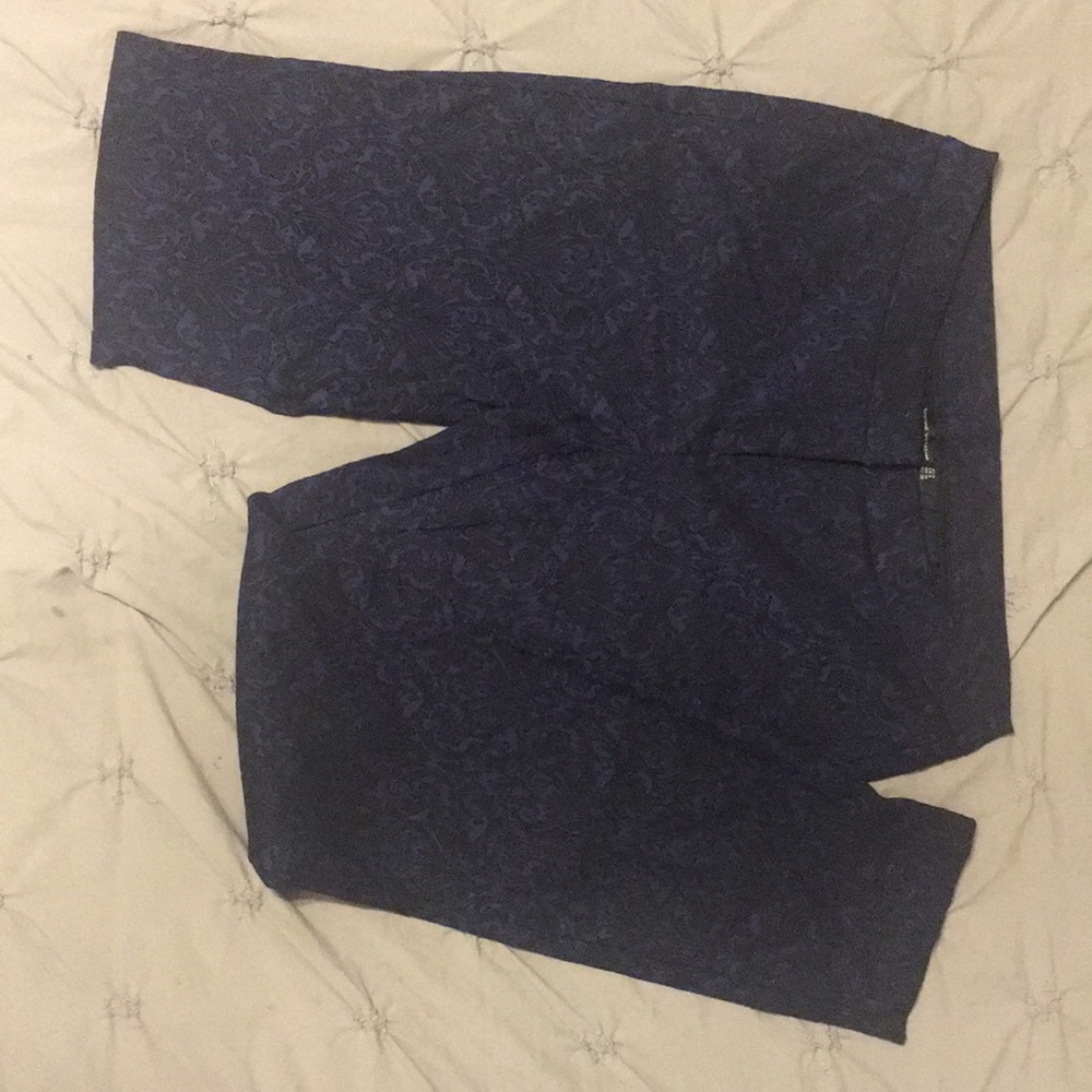 Navy blue pants with black design. (US 6)